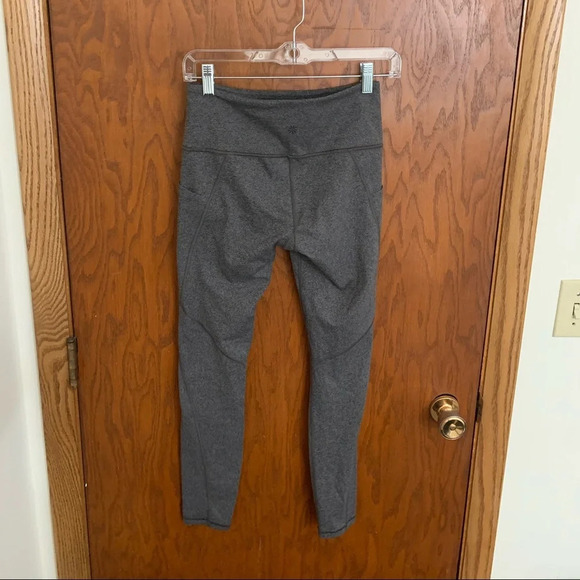 Athleta Stash Pocket Salutation Tight Leggings - Picture 6 of 6